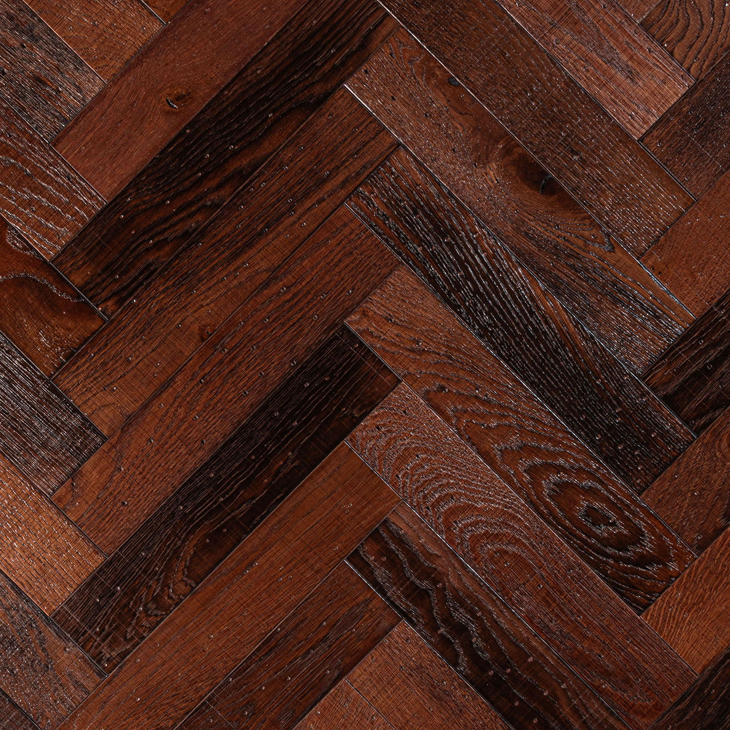 Staley Avenue warm red-brown rustic oak flooring with sawn marked surface.