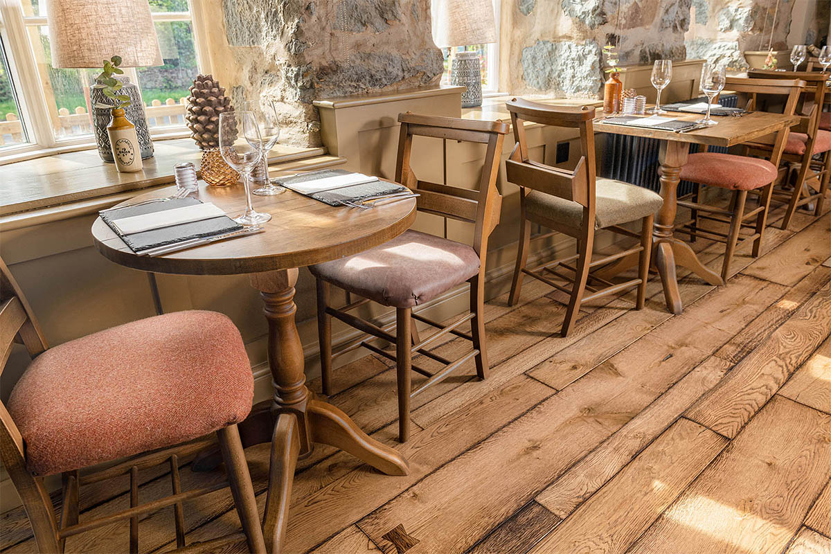 Distressed engineered wood floor inside a country inn.