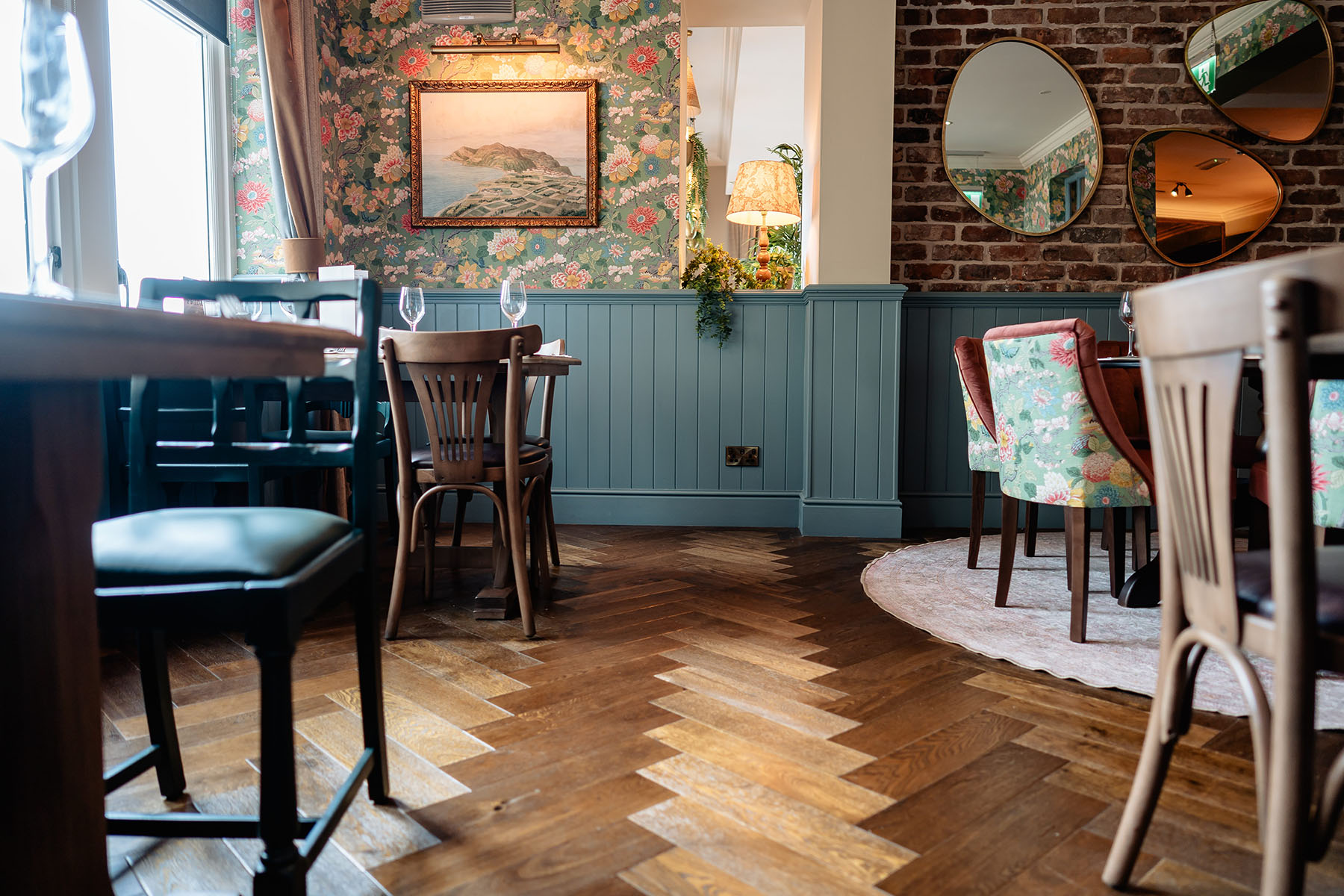 Rustic distressed parquet oak floor with cobbled edges.