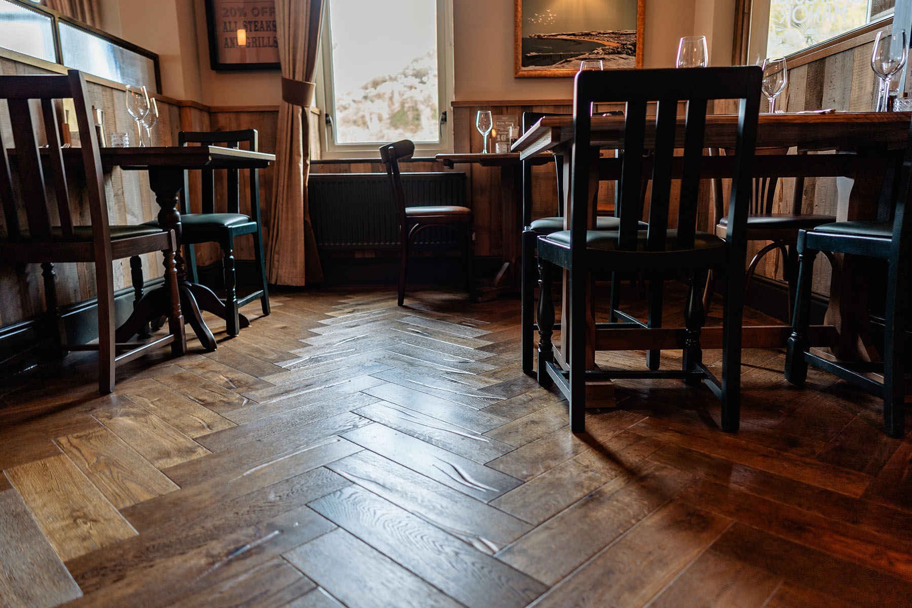 Melrose Collection herringbone oak flooring at Craigside Manor.