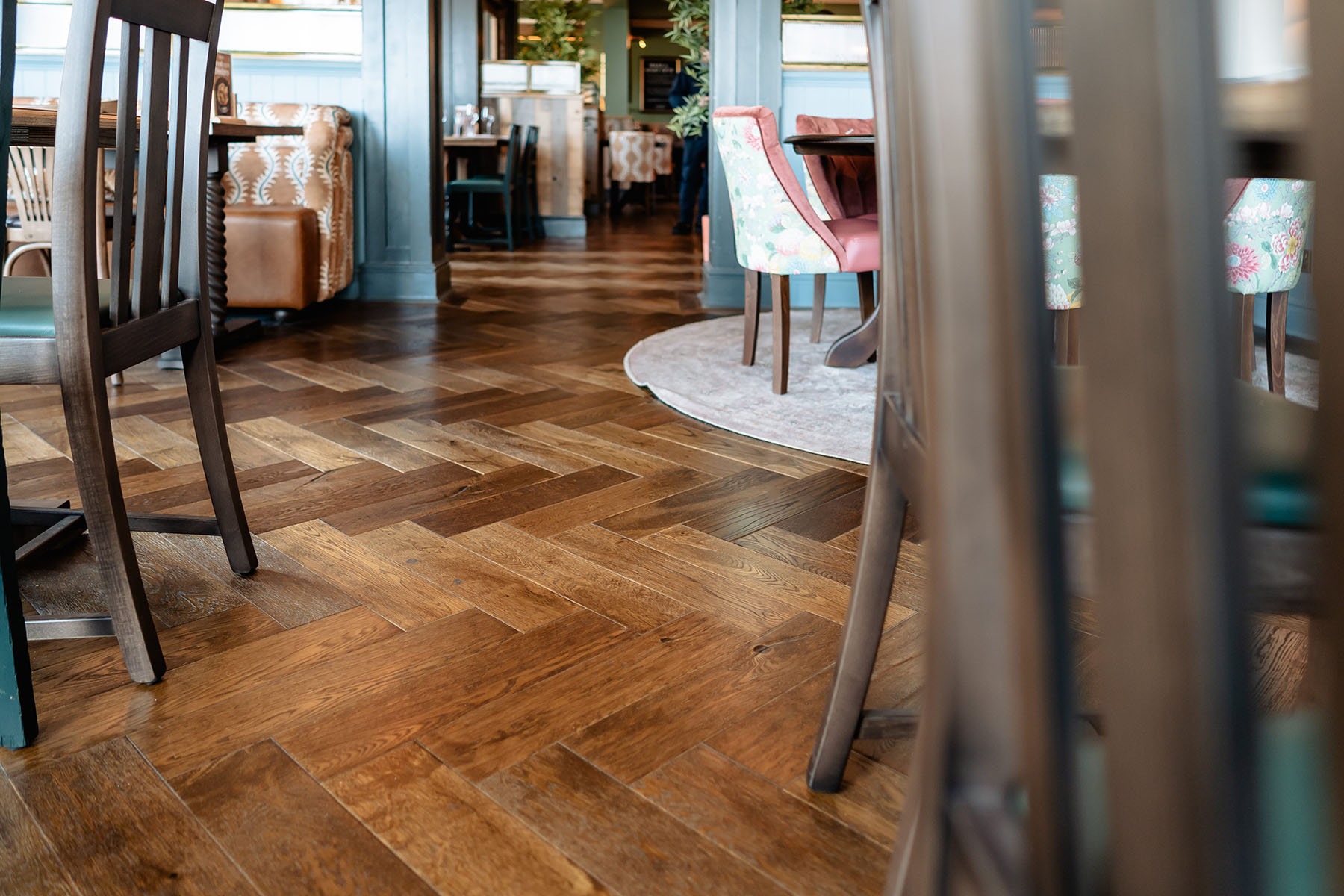 Rustic distressed parquet oak floor with cobbled edges.