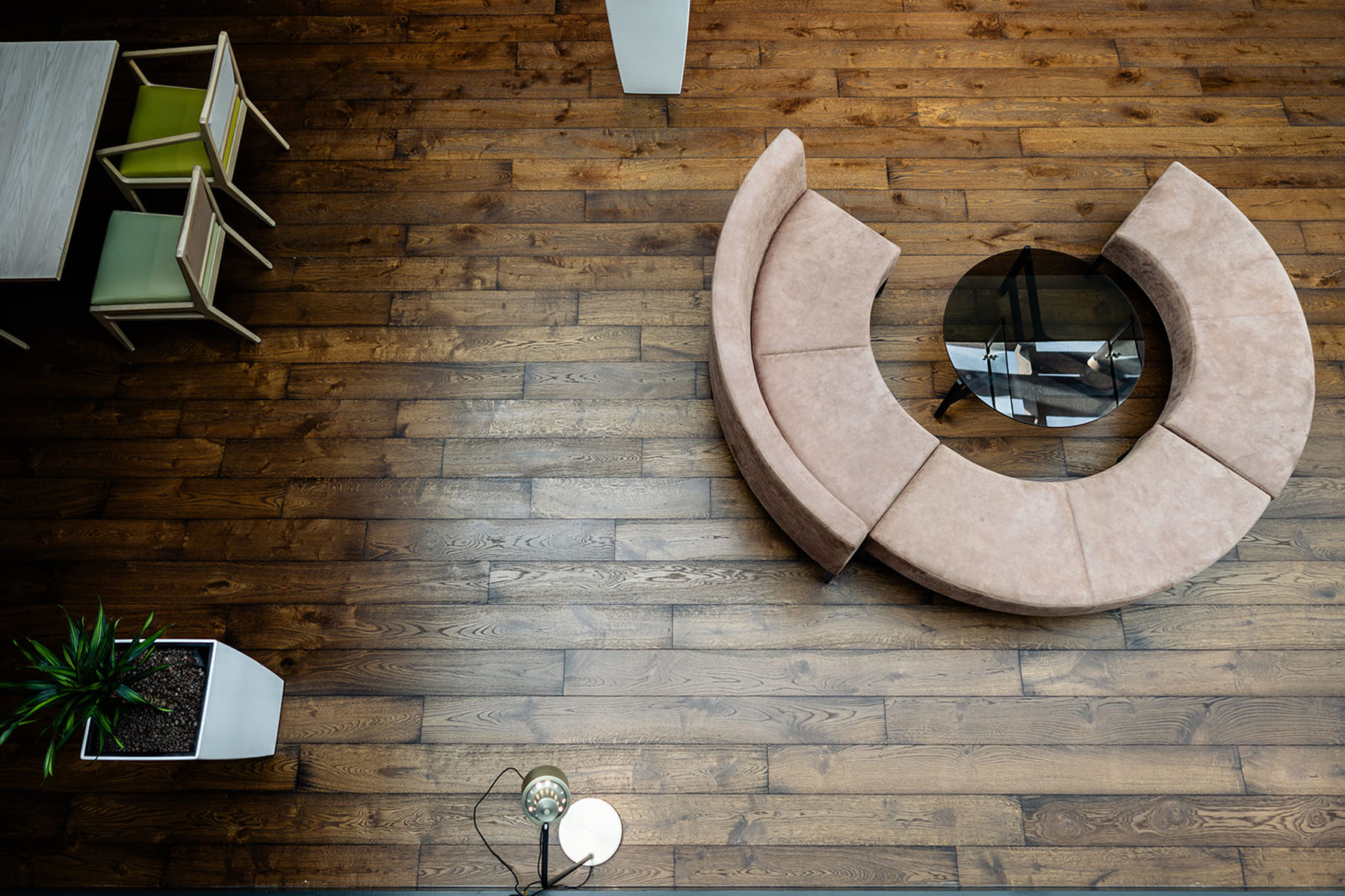 Distressed oak floor with micro bevelled edges in Orchard Hotel reception.