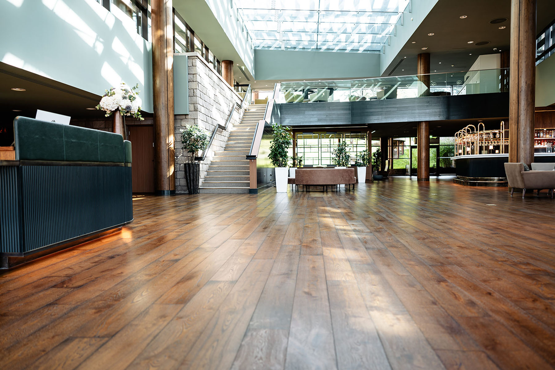 Durable oil-finished oak flooring in commercial hospitality space.