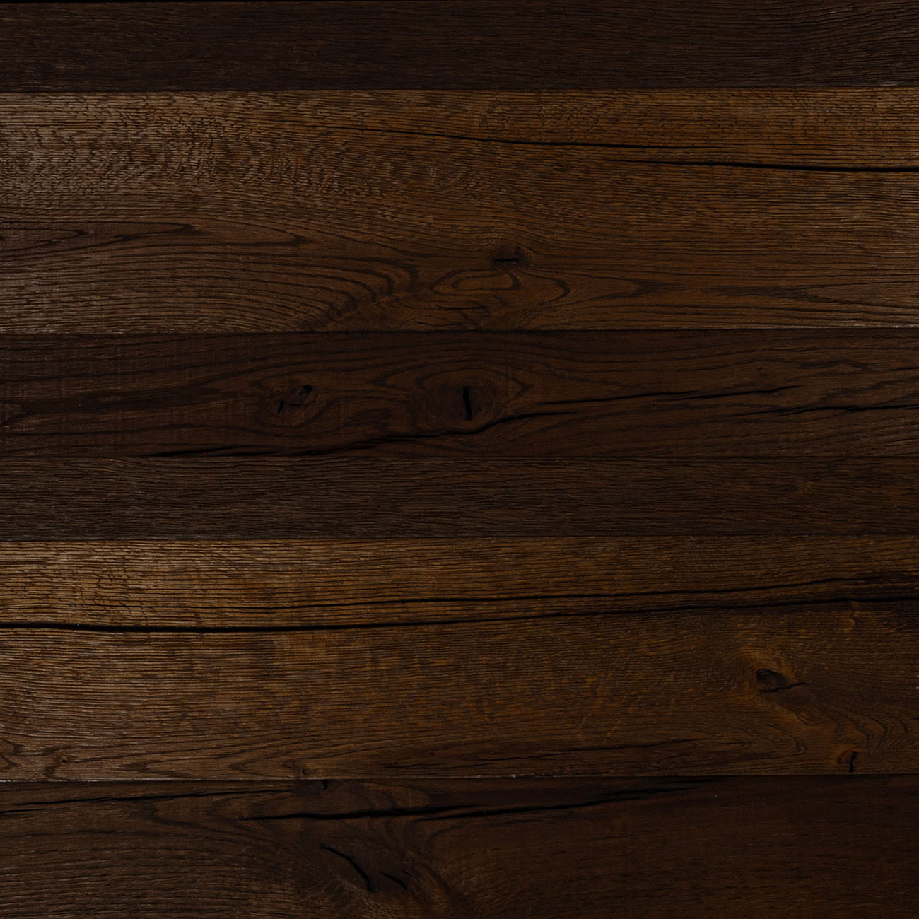 Mitchells Lane walnut-brown oak wall cladding with reddish tones.