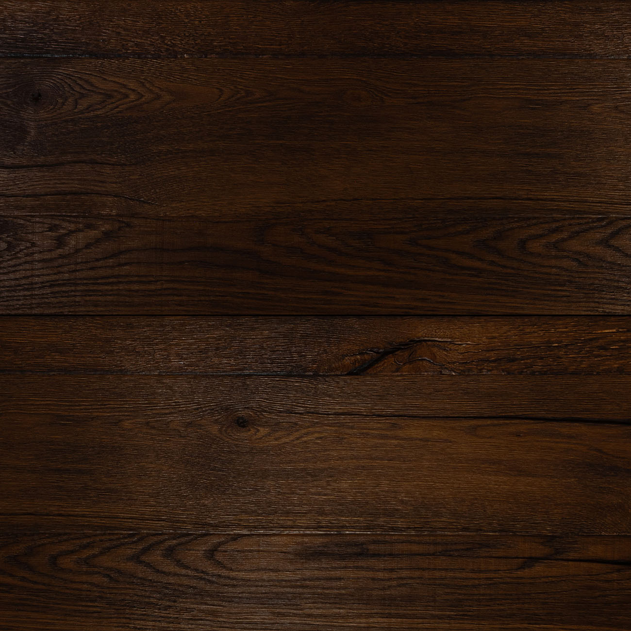 Monarch Walk cladding in mahogany-brown tones with a rustic texture.