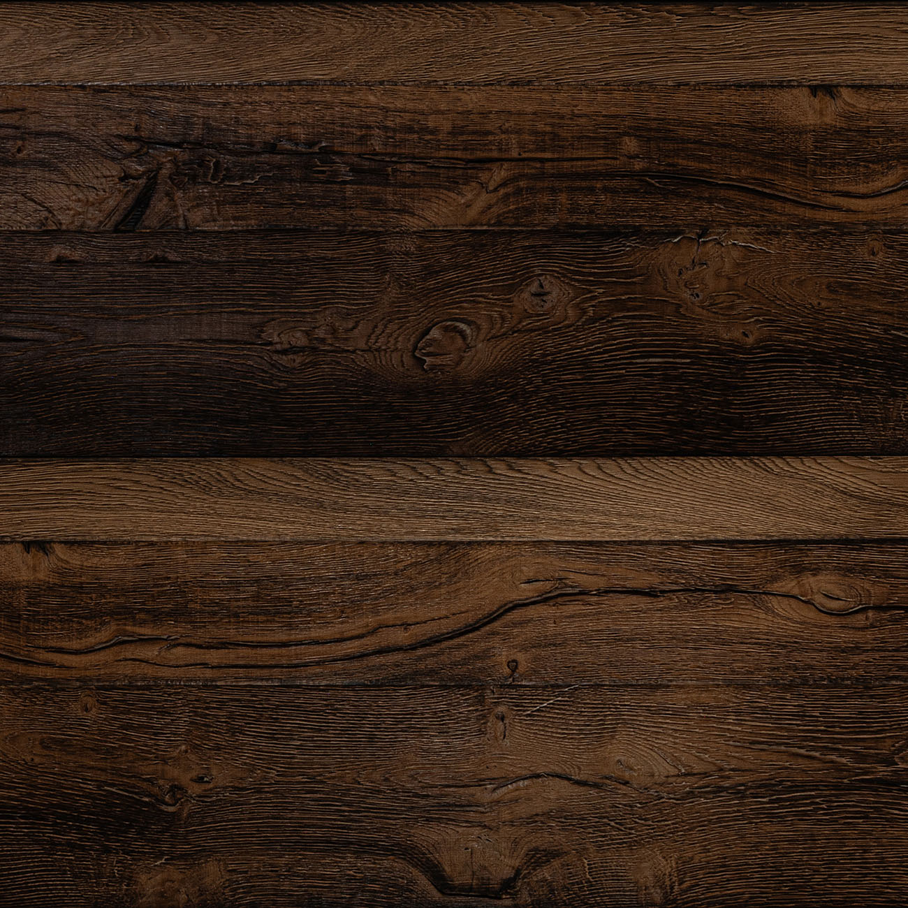 Valdelis Street cladding in dark coffee-brown with a rustic texture.