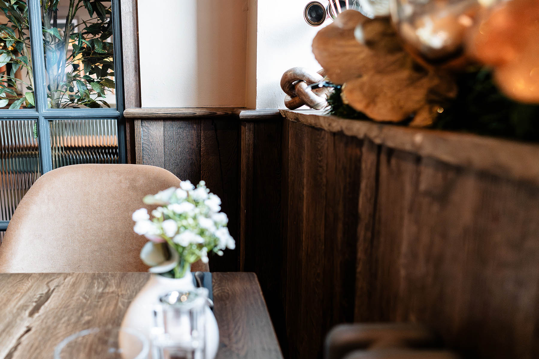 Brushed oak wall cladding detail showing grain and knots