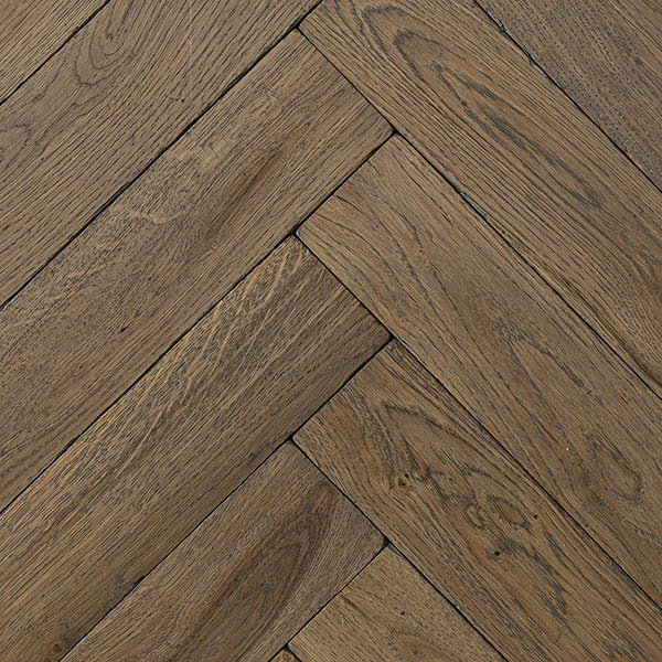 Solid oak herringbone with tongue and groove, tumbled edges, and polished surface
