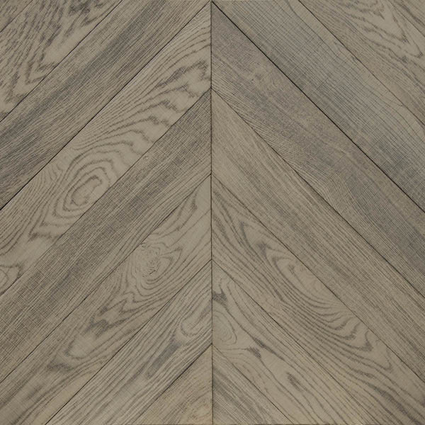 Engineered chevron wood floor with distressed and skipsawn surface treatment and micro bevelled profile