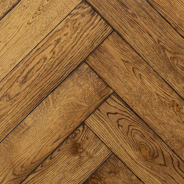 Brushed, worn and distressed herringbone wood floor made from engineered European oak d