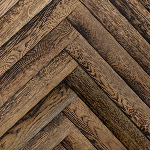 Brushed and branded herringbone wood floor made from natural grade European oak