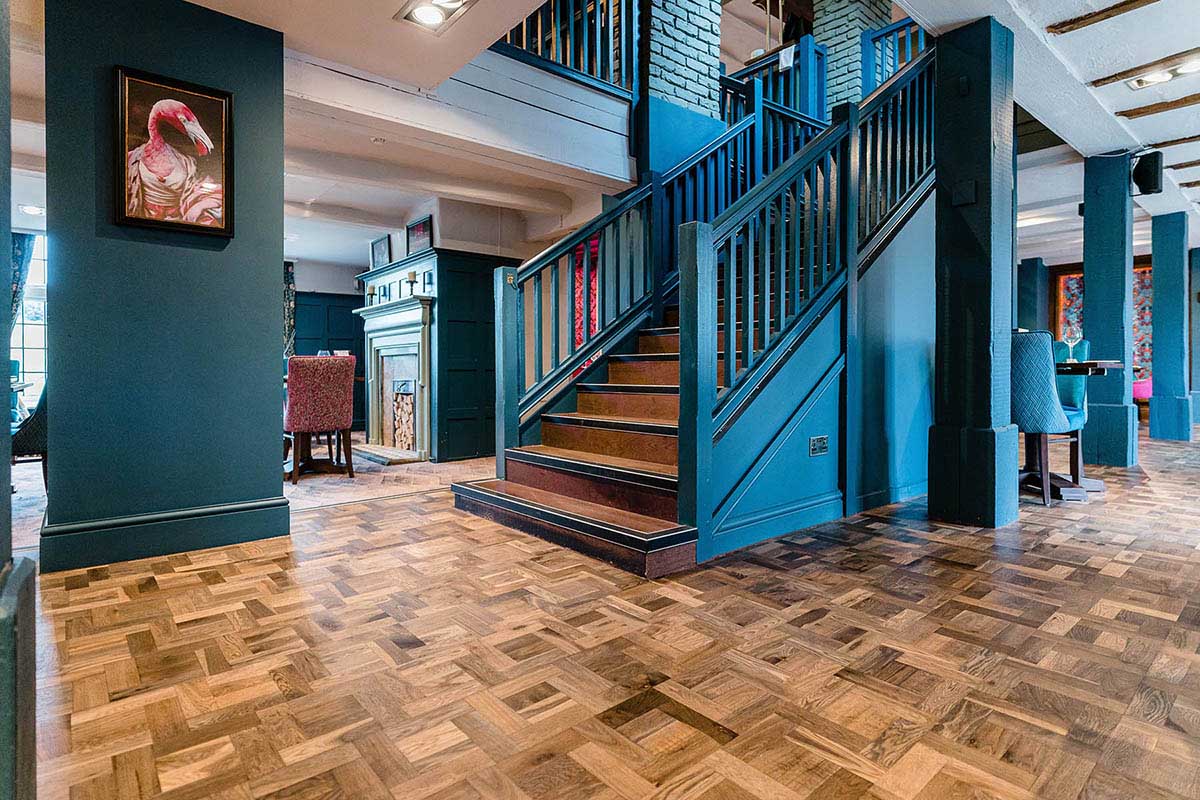 Modern Parquet engineered wood floor inside a commercial property.